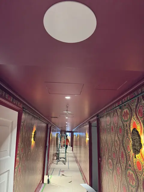 Corridor lighting in a renovated hallway