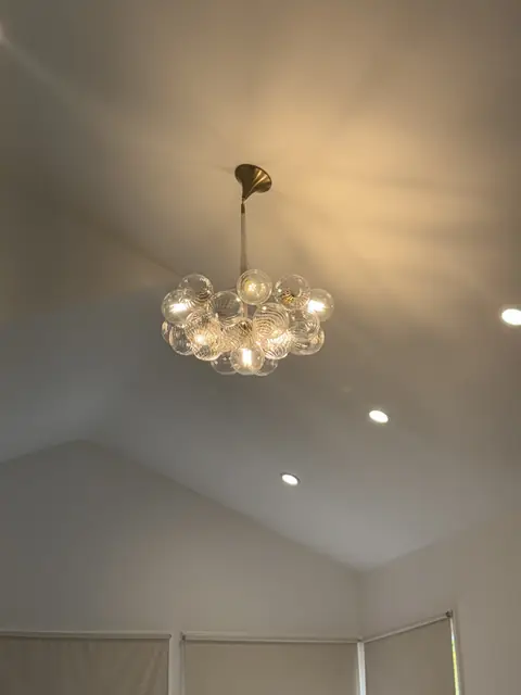 Bubble chandelier in a vaulted room
